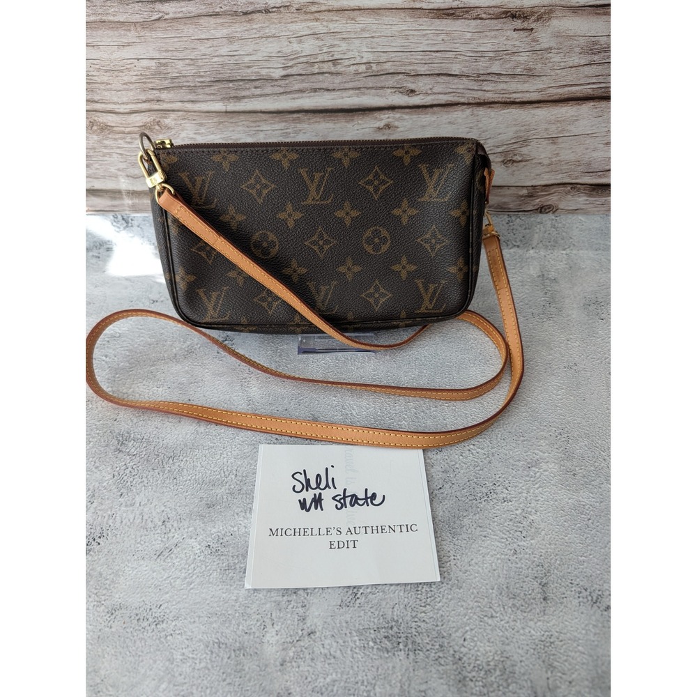 Pochette Accessories with COA crossbody strap and dust bag.